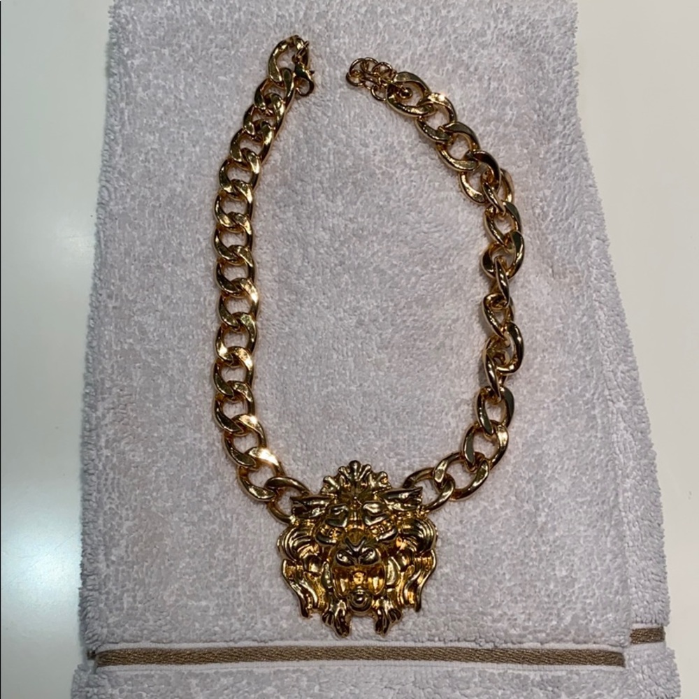 Gold statement necklace with lions head